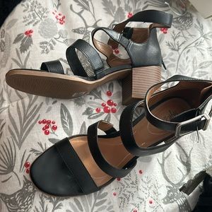 Size 9 1/2 black strapped shoes